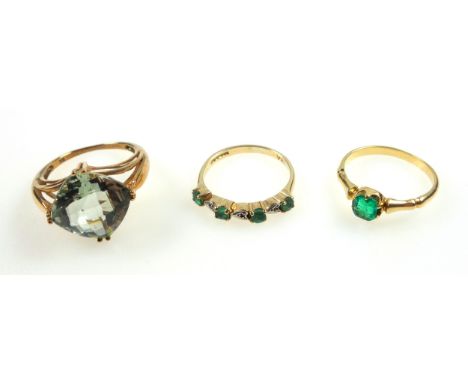 9ct gold ring with 4 emeralds and 3 illusion set diamonds, yellow metal ring set emerald, and another ring set tinted stone, 