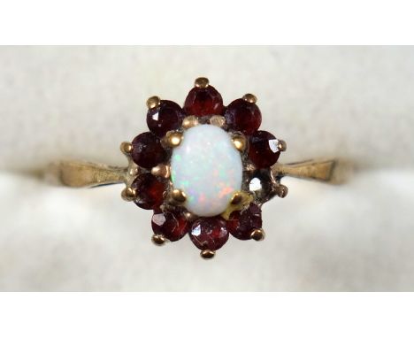 9ct gold opal and garnet floral ring, gross 1.9 grams (1 garnet missing) Necklaces, brooches and other costume jewellery (a l