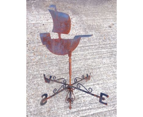 Old cast iron weather vane surmounted by a stylised sailing ship, H.93.5cm 