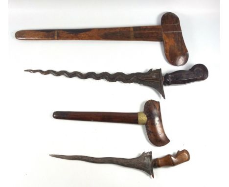 Indonesian Kris with a wavy etched Pamor blade, with wooden scabbard and hilt, blade L.39cm, (Rust and chips to blade edge); 