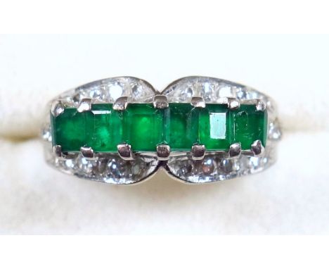 White metal ring set 6 trap cut emeralds and diamonds, stamped 585, gross 5grs 