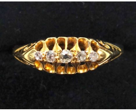 Edwardian 18ct gold ring with 5 diamonds in an open setting, gross 1.8grsSize 11 