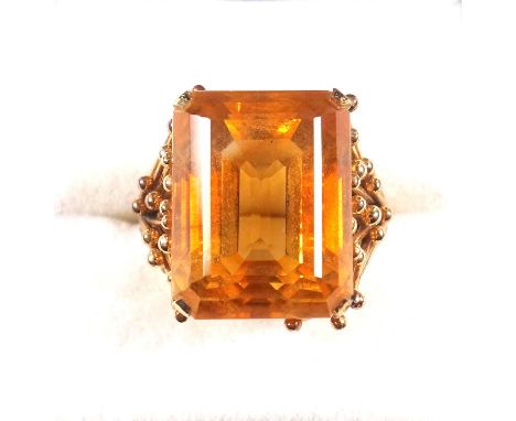 Yellow metal ring set emerald cut citrine, 18 x 14 mm, stamped 18K, gross 11.6grs 