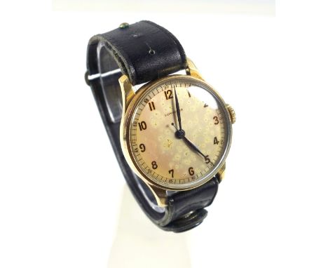 Longines yellow metal gentleman's wristwatch with an ivory coloured dial, black Arabic numerals and sweep seconds hand, enclo