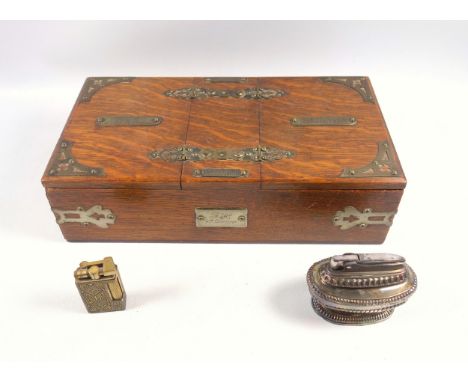 Victorian oak presentation cigar and cigarette box, with two separate compartments, applied brass decoration and a plaque eng