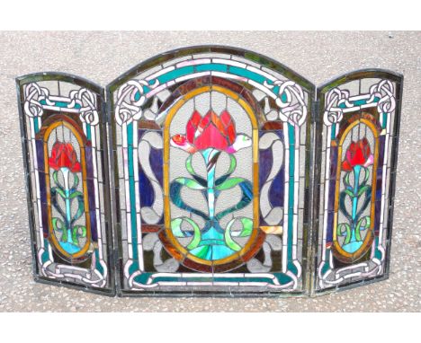 Art Nouveau style folding fire screen with 3 arched panels of leaded polychrome and frosted glass, 70.7 x 104.8cm overall. (s