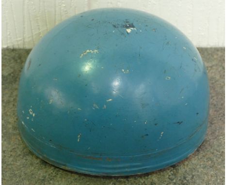 An Everoak "pudding basin" cork lined blue helmet. Provenance; Worn by Bob Hutsby, who competed in many trial events on a But