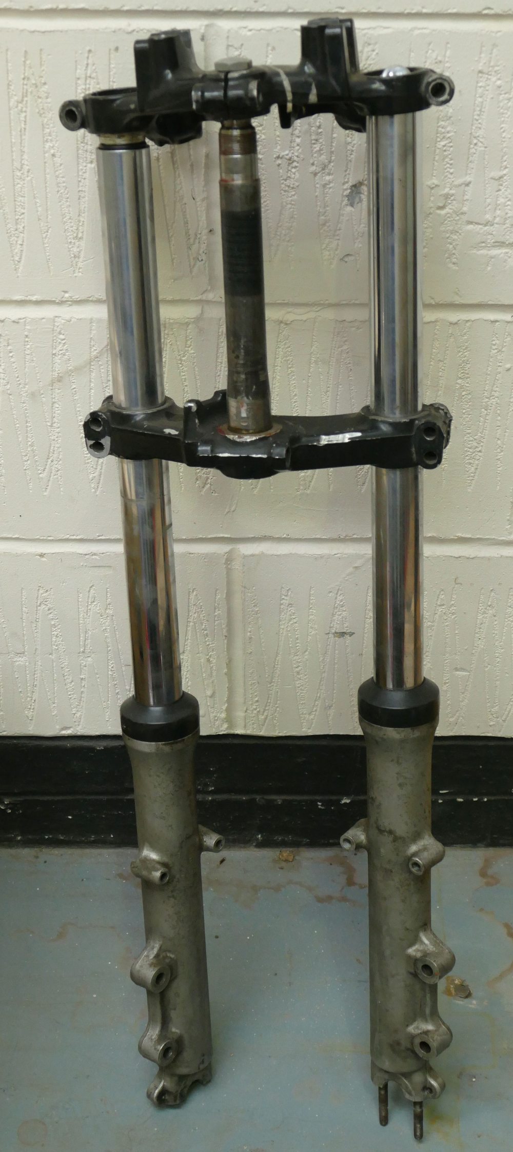A pair of believed Suzuki GS 1000 front forks, used.