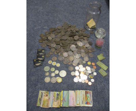 Two silver half crowns, one Victorian and a later example, two Victorian silver shillings, a collection of old pennies, a lat