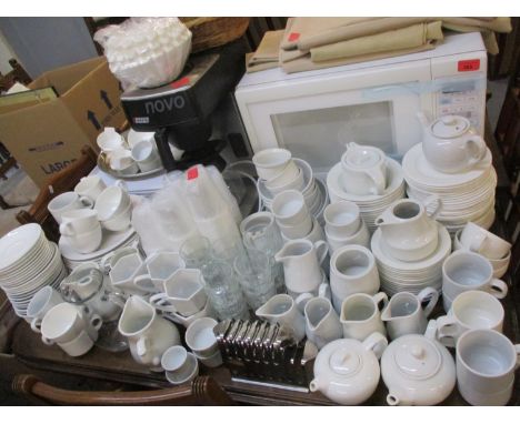 Kitchen items comprising a Proline white Micro Chef T44 microwave, a Bravilor Bonamat Novo coffee maker with filters, caterin