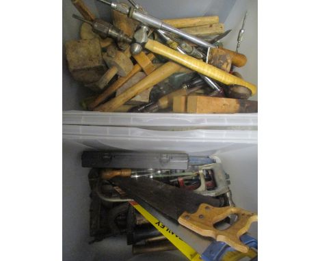 A selection of tools to include saws, clamps, drill bit and other mixed tools 