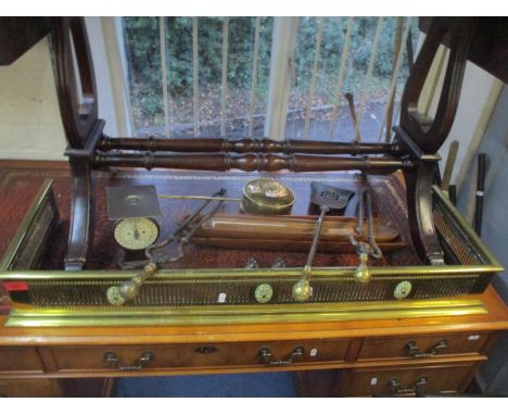 An Edwardian style brass fire guard 105 l x 32.5cm d, Victorian fire implements, a Salters letter balance scales, pair of sil