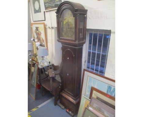 An eight day, four pillar movement and oak cased long case clock having a pendulum and two weights 