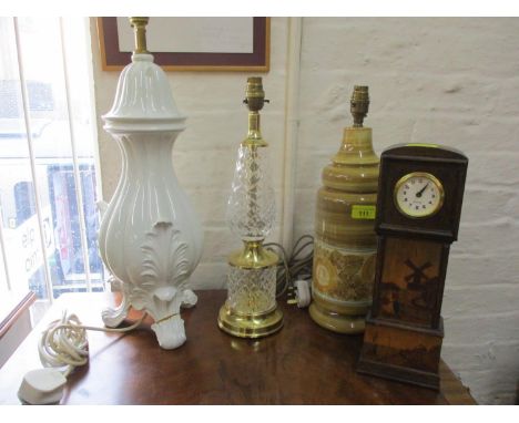 An Edinburgh crystal and brass table lamp and two other (one A/F) together with a miniature treen Meccedes long case clock wi