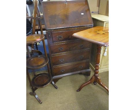 Three items of early to mid 20th century furniture comprising a mahogany bureau 100cm high x 40cm wide x 54cm wide, a folding