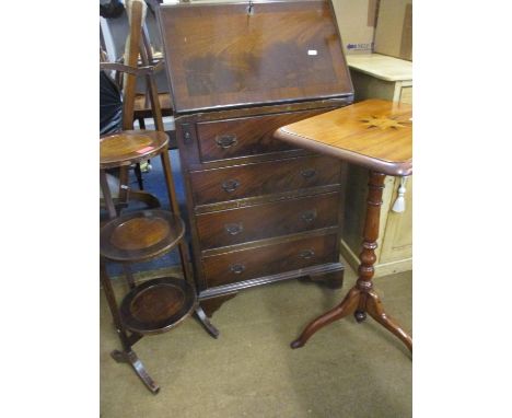 Three items of early to mid 20th century furniture comprising a mahogany bureau 100cm high x 40cm wide x 54cm wide, a folding