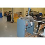 R Howard Strausbaugh, Model M-75, peunmatic press on skid. Mounting press