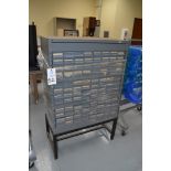 General Instruments gray metal parts organizer with 96 tray drawers on metal stand