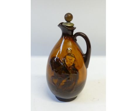 ROYAL DOULTON/GREENLEES BROTHERS WHISKY CRUSADER KINGSWARE POTTERY FLASK of footed baluster form with loop handle and Dewar's