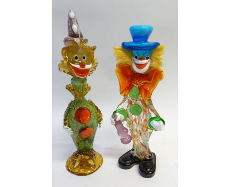 TWO COLOURED GLASS FIGURES OF CLOWNS, one a decanter, 17" and 15 1/2" (43.2 and 39.4cm) high (2)
