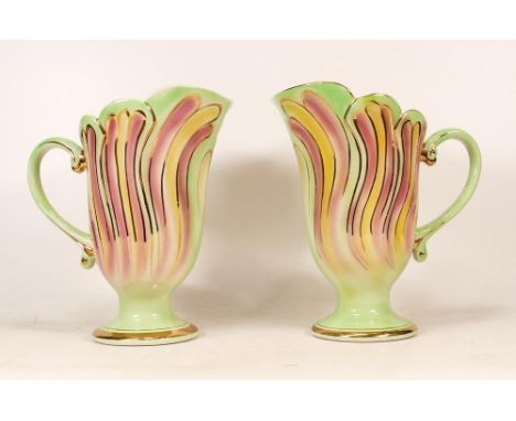 Cloughs Royal Art Pottery , Pair of Art Deco Jugs, one A/f, height 20.5cm(2) 