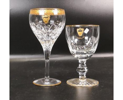 Two De Lamerie Fine Bone China heavily gilded Non Matching Wine Glasses with Bahrain Crest , specially made high end quality 