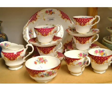 A Paragon Rockingham pattern tea service for six comprising side plates, creamer, sugar bowl, six cups and  four saucers.