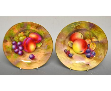 A Royal Worcester shaped circular tea plate, by E Townsend, signed, painted with ripe fruit on a mossy bank, 17cm diameter, p