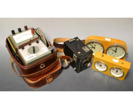 A MOM chess clock; another BHB; a Kodak six 20 Brownie C camera; a Unigor 4P voltmeter, cased (4)