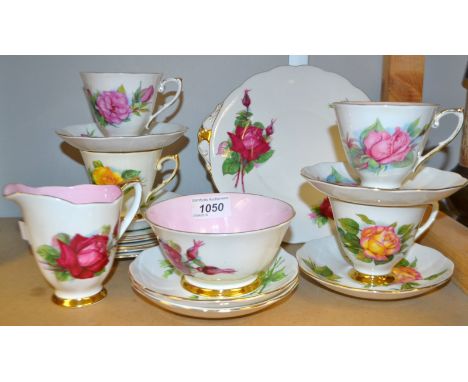 A Roslyn china series of  authentic world famous Wheatcroft roses pattern tea service  comprising cake , five plate,side plat