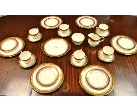 A Duchess Winchester dinner service for six comprising  24cm plates, 16cm plates, creamer, sugar bowl,  bread and butter plat