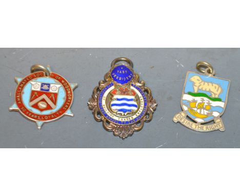 Three silver and enamel fobs