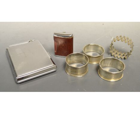 A Colibri Monopol cigarette case and lighter, silver plated napkin rings, etc