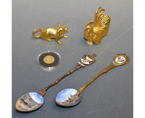 A Cooke island 2003 dollar ;Italian enamel spoons ;a gold plated EPNS cockerel model, another as dog (5)