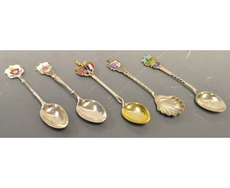 Five silver and enamel teaspoons, including Derby armorial