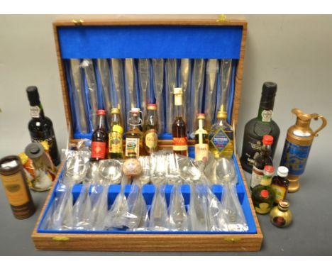 A stainless steel canteen of cutlery; miniature liqueurs, Sandeman port, Kenmore Scotch whisky, Ouzo, Glenmorangie, etc