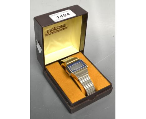 An Excalibur digital wrist watch, with box and papers