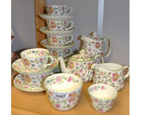 A Minton Haddon hall tea service for six comprising bachelor teapot, hot water jug, sugar bowls, creamer, side plates, cups a