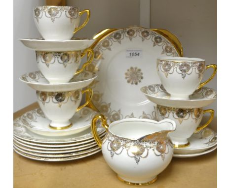 A St. Leonards/Grafton Burslam pattern tea service for six, comprising side plates, cake plate, cups and saucers.