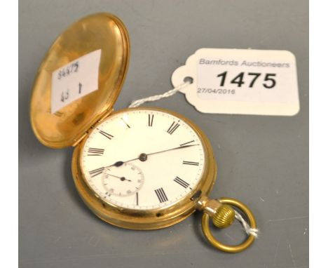 A continental 10k gold hunter pocket watch, white enamel dial, Roman numerals, subsidiary seconds dial