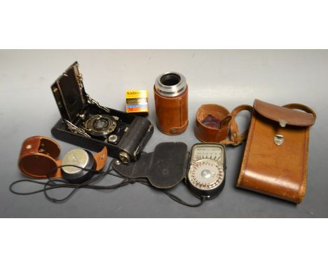 Cameras - an Eastman Kodak Number One Pocket folding camera, brown leather case; a Wray London Lustrar lens, f.4 90mm, no 160