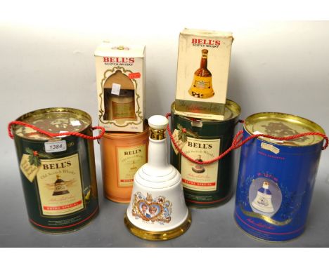A Bell's Whisky decanter, with contents, commemorative edition, boxed; others similar; some empty bottles (7)