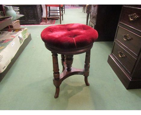 An Edwardian button seat piano stool, 45cm high