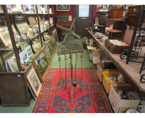 A brass companion set of windmill design with five hanging tools on turned tripod stand