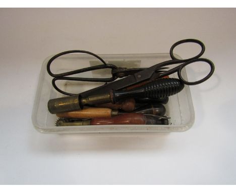 Bygone tools including leather working, shooting and scissors
