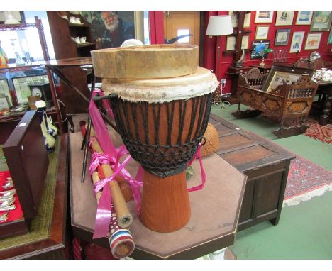 An African drum, tambourine, rain stick and didgeridoo etc.