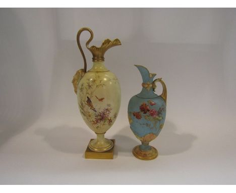 Two circa 1900 Royal Worcester ewers, one blush ground with gilded base and handle, 20cm tall and 27cm tall