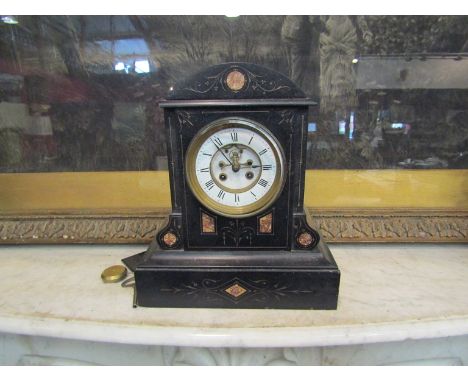 A Victorian black slate mantel clock with Roman numerated enamel and brass dial, visible escapement a/f