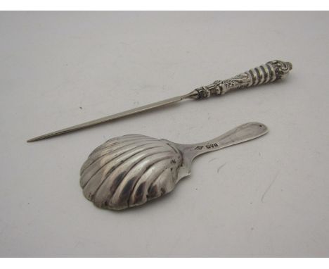 A silver caddy spoon marked Chester and a silver handled letter opener 