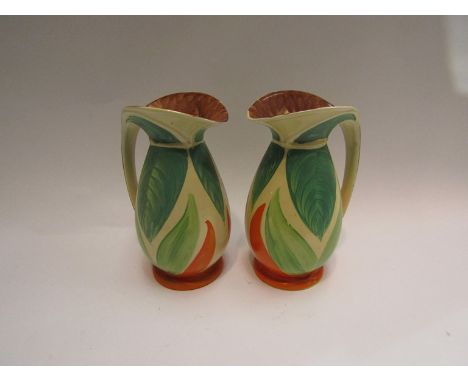 A pair of 1930's Art Deco Myott Son &amp; Co hand-painted vases in the Clarice Cliff style,  20cm tall